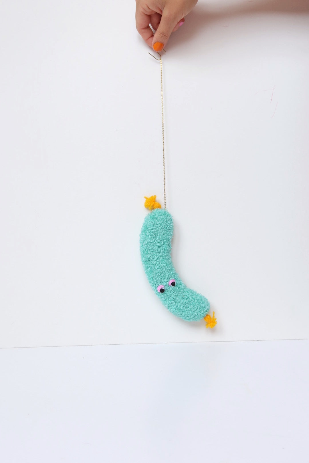Furry Sausage with Eyes - Light Blue and Yellow Textile Art