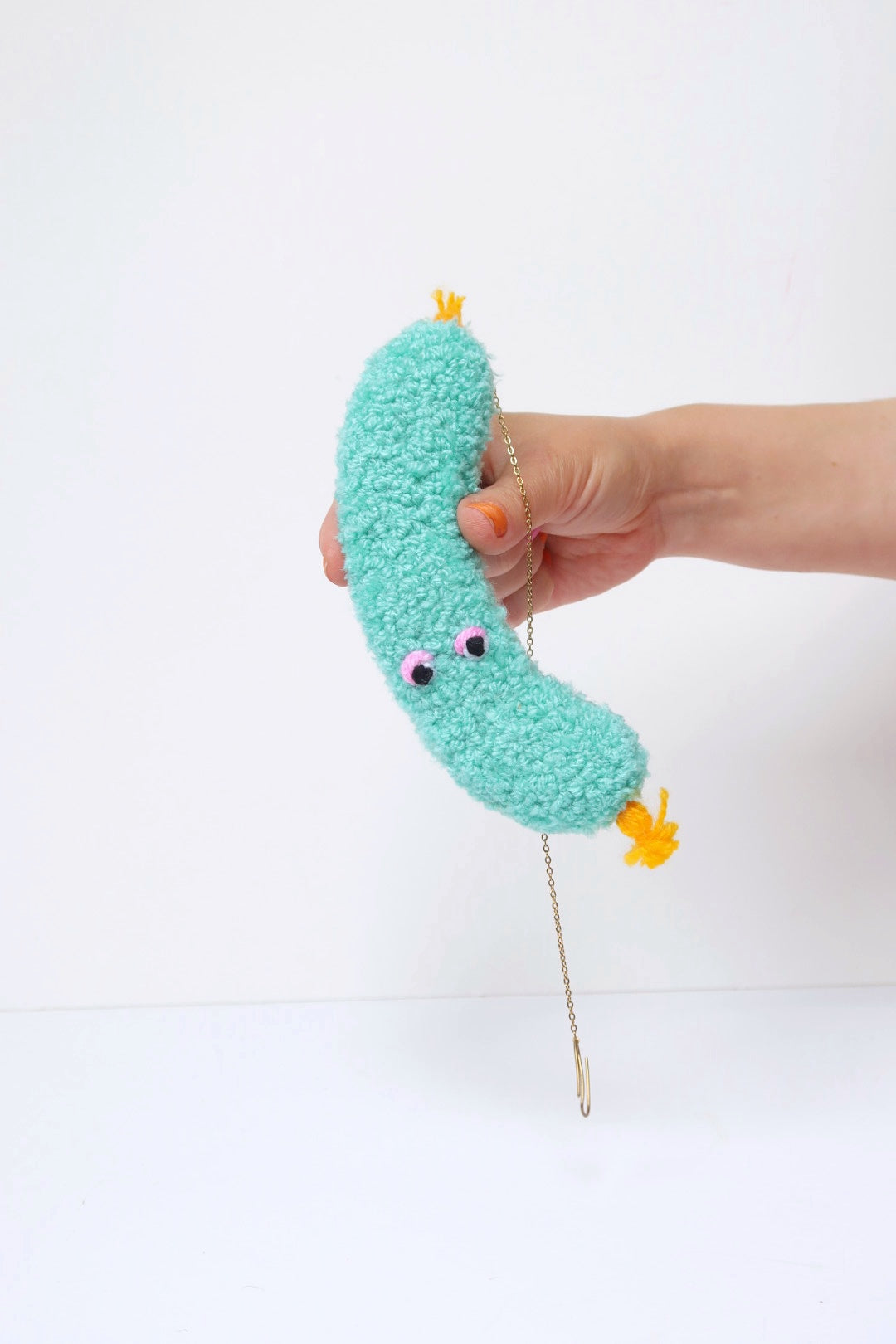 Furry Sausage with Eyes - Light Blue and Yellow Textile Art